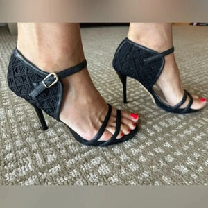 Escada sheepskin black heels